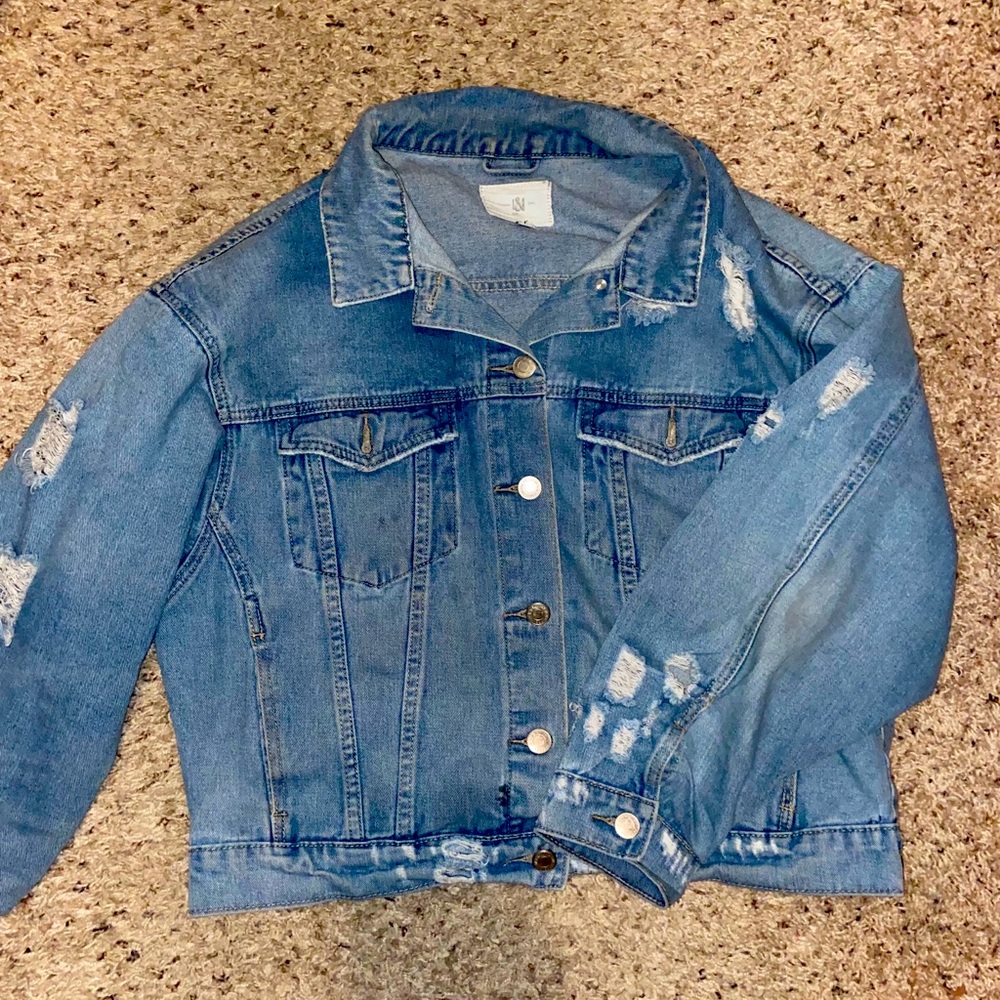 Hand painted Light Colored Denim Jacket.